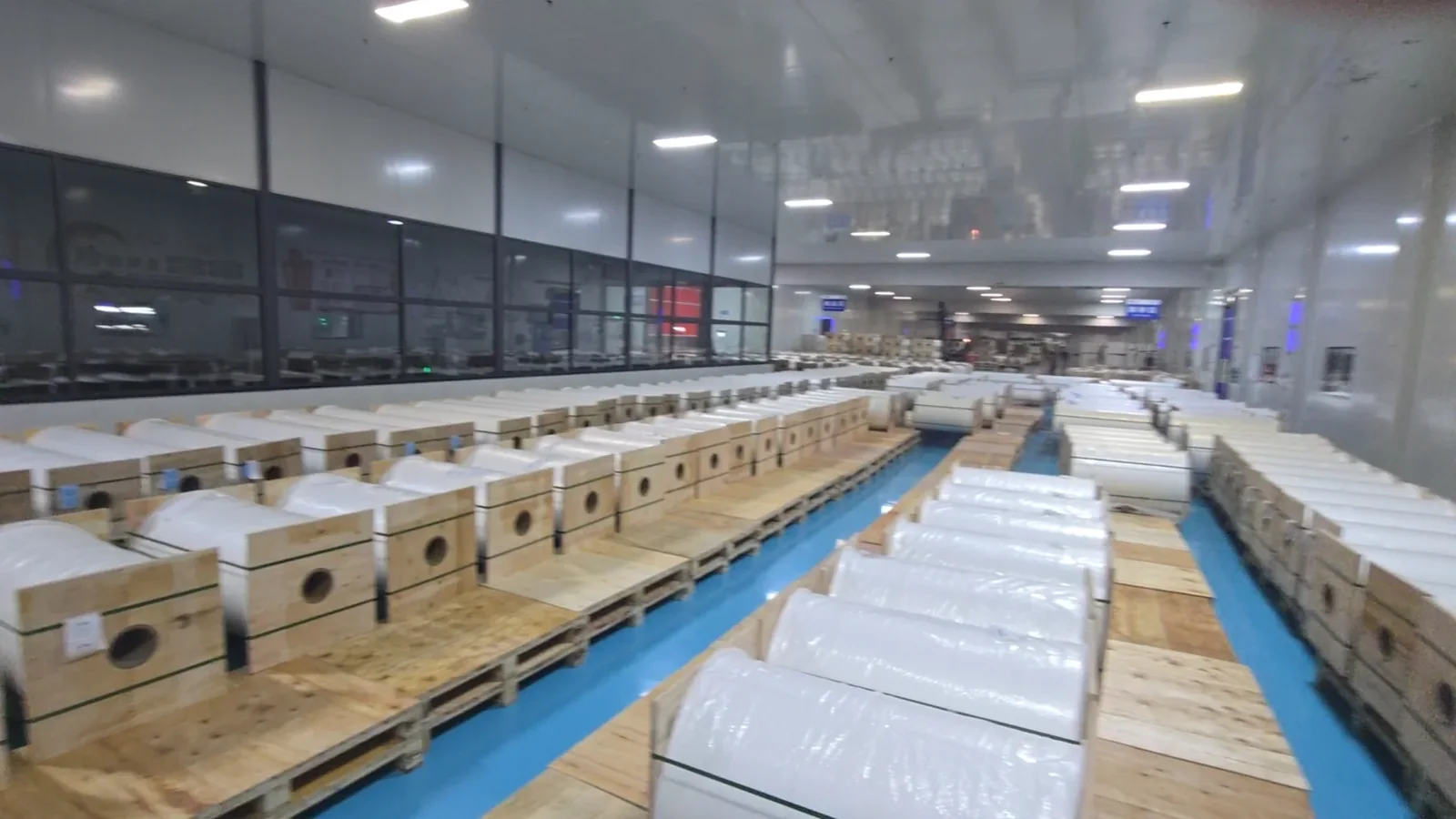 Palletized film rolls in warehouse