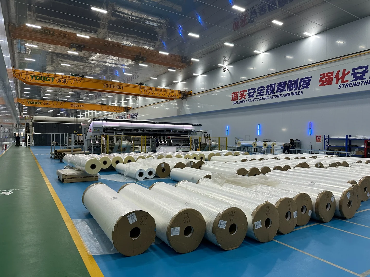 Film workshop with finished rolls and slitting equipment
